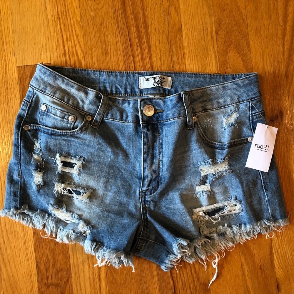 Light wash distressed jean shorts
